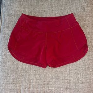 Red Lululemon shorts